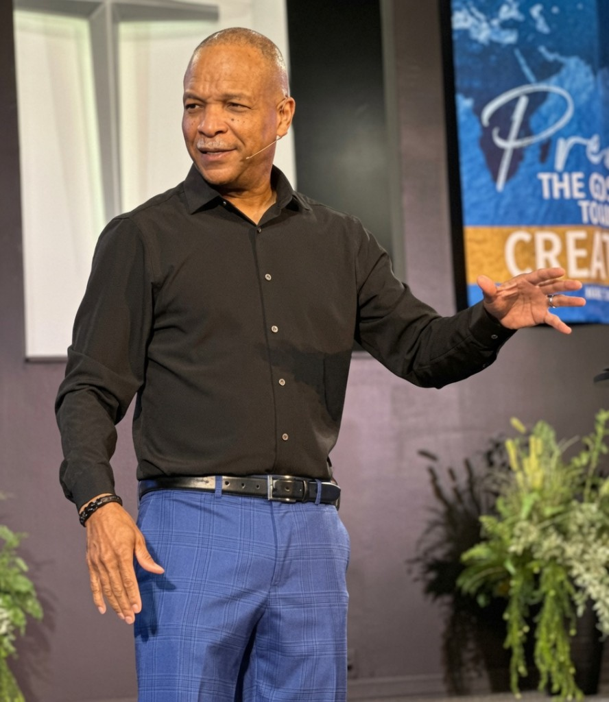 Pastor Robert Gardner preaching at City of Faith